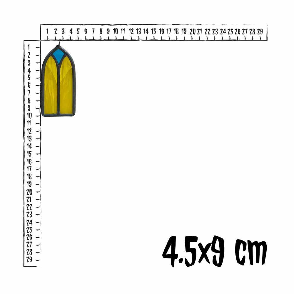 Measurement of a yellow and suncatcher with a ruler on a white background
