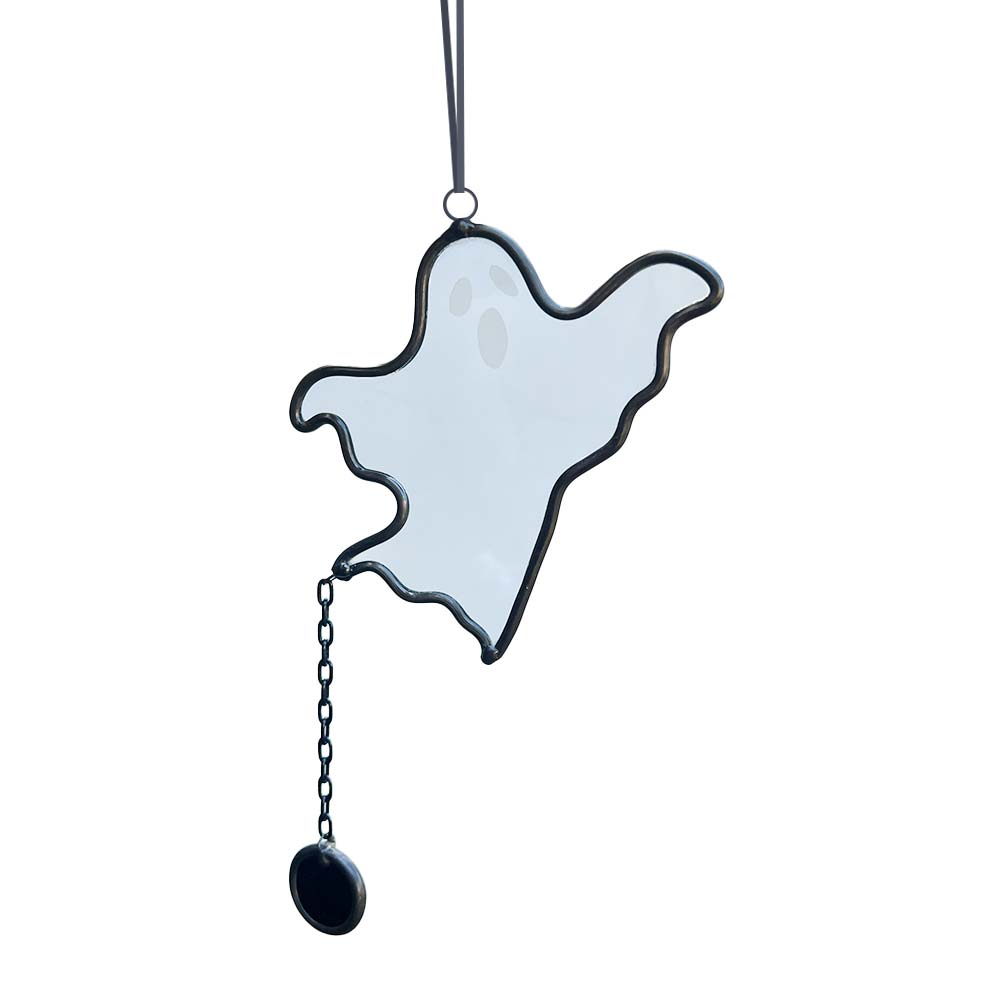 Ghost-shaped ornament with a chain on a white background