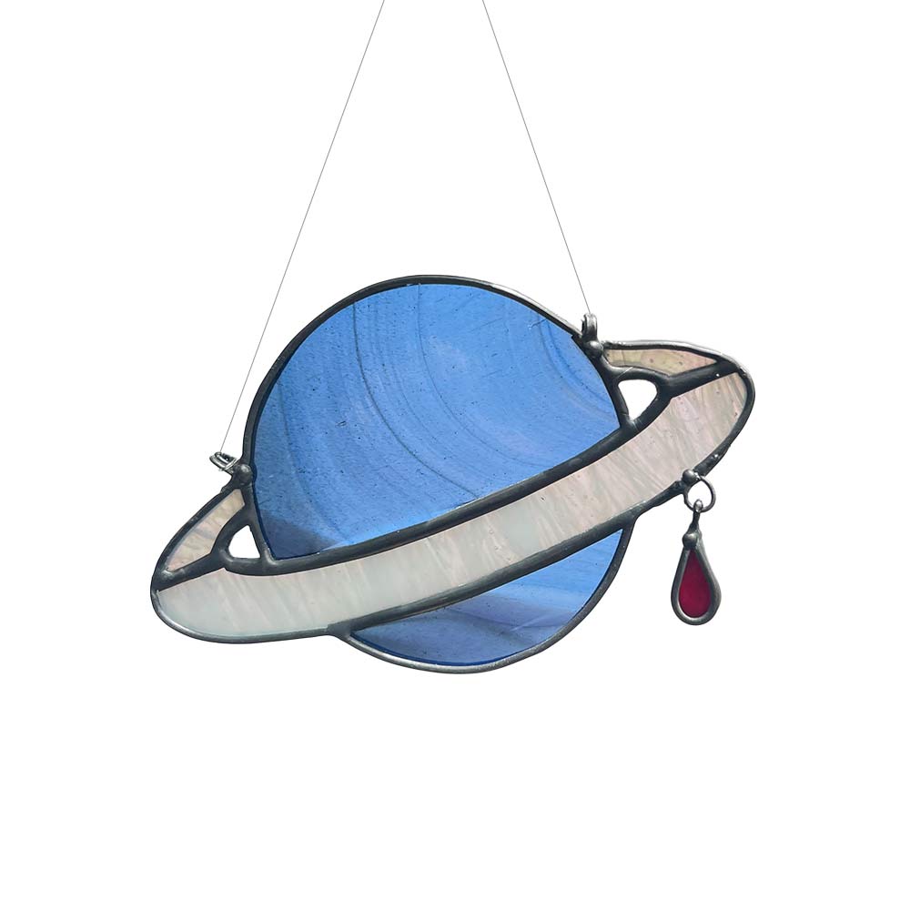 Handmade blue stained glass planet window art with red drop, decorative suncatcher for home.