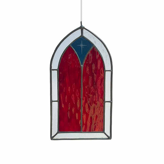 Stained glass window with red and blue design on a white background