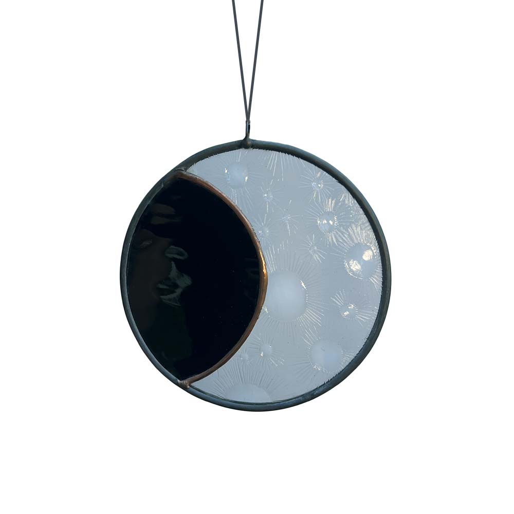 Lunar Eclipse Stained Glass piece with craters on a white background.