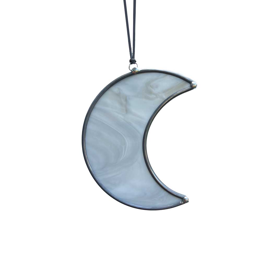 Marbled grey rescent moon-shaped stained glass ornament on a white background