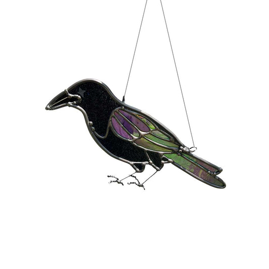 Stained glass crow decor on a white background