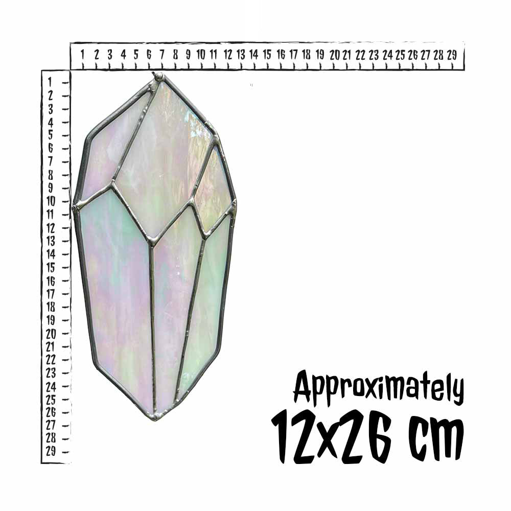Stained glass Gemstone next to a ruler indicating its size.
