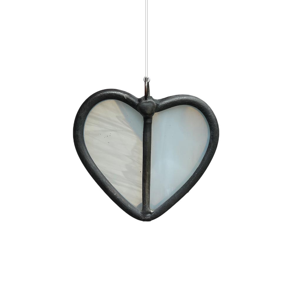 Delicate white stained glass heart decor, handcrafted ornament for home or window display.